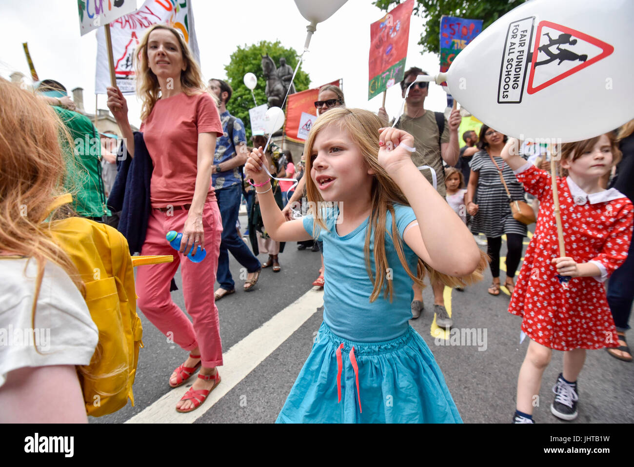 London, UK.  16 July 2017.  Parents, pupils and teachers gather for an event called 'Carnival Against The Cuts' marching to Parliament Square.  The demonstration, organised by Fair Funding For Schools, a parent led campaign, calls for the government to increase funding for schools.   Credit: Stephen Chung / Alamy Live News Stock Photo