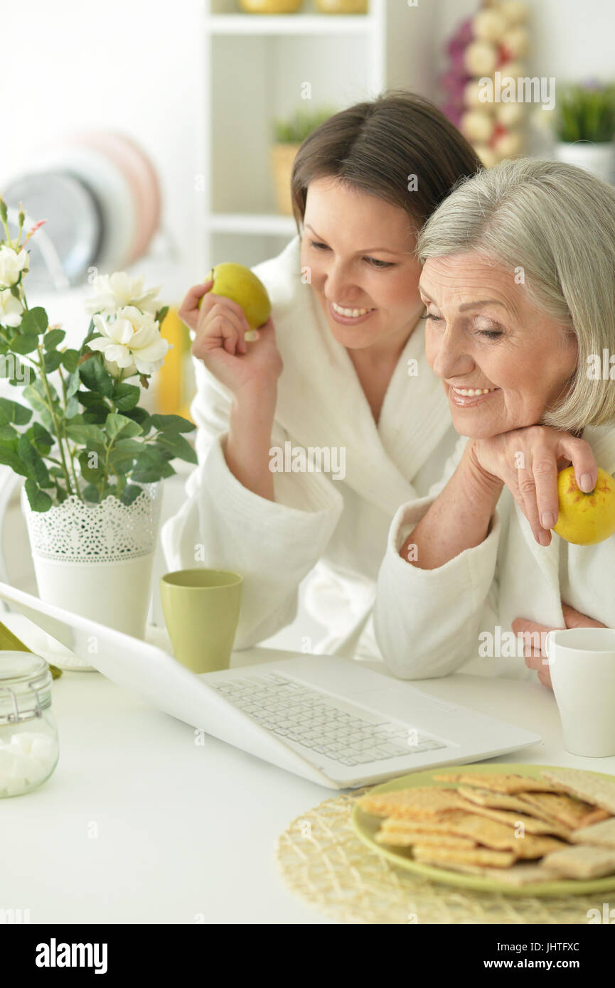 Mother and daughter with laptop Stock Photo