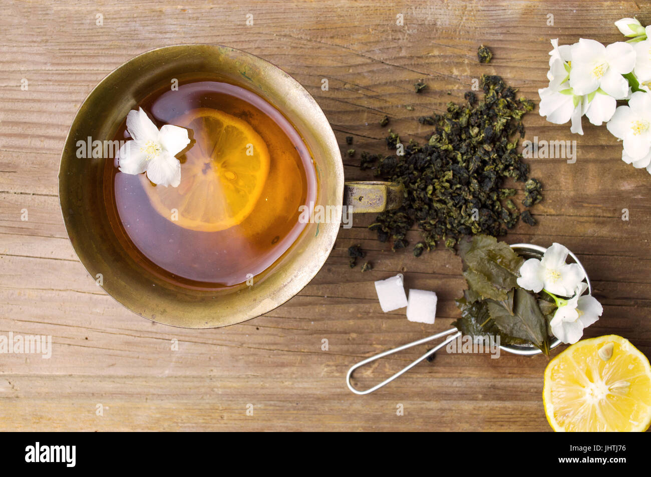 Green herbal tea with jasmine in a cup Stock Photo Alamy