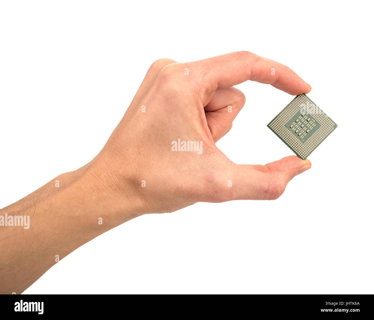 man's hand holding a computer processor isolated on white background Stock Photo