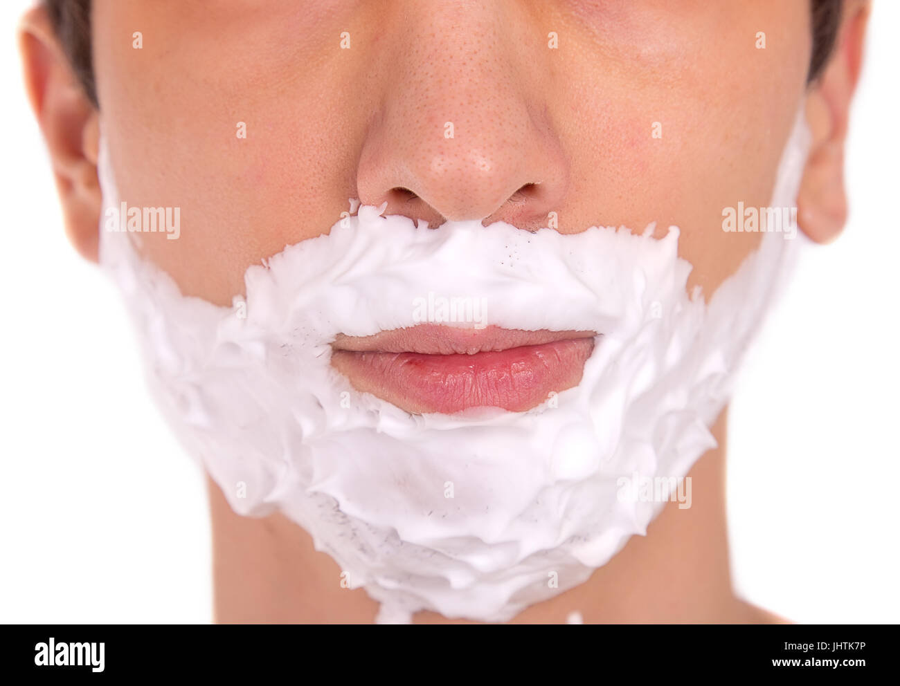 man's face with shaving foam close up isolated on white background Stock Photo