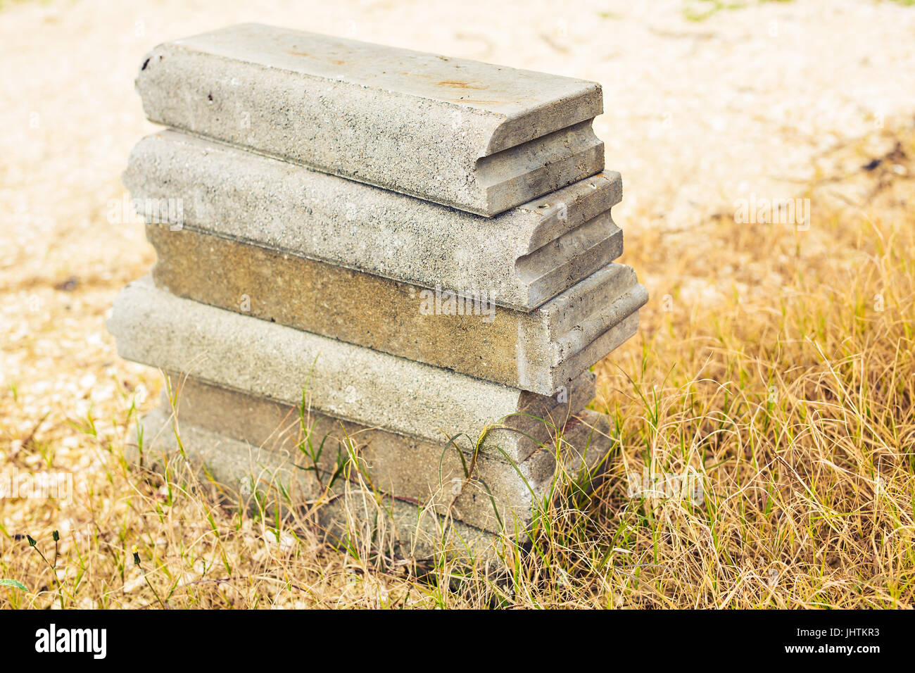 Concrete blocks on the grass Stock Photo Alamy