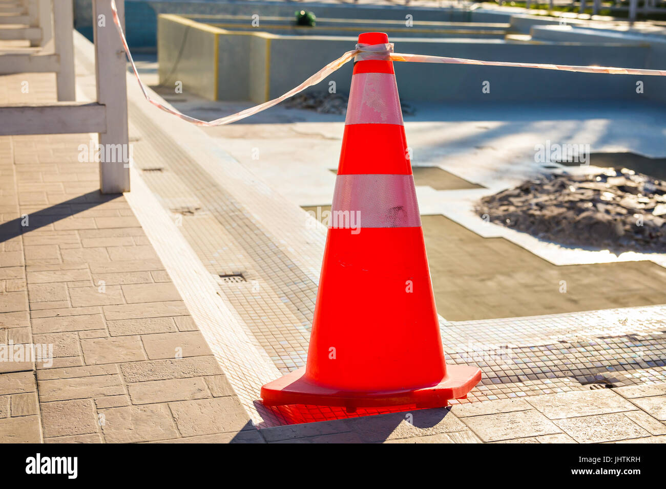 Plastic striped orange cone on the road. Traffic cone Stock Photo Alamy