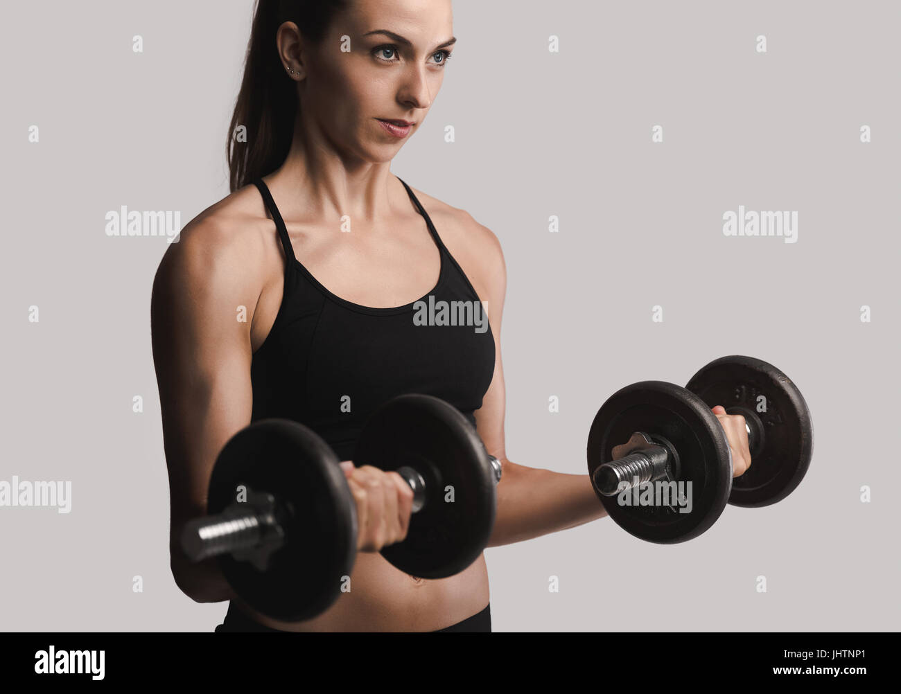 Woman bicep curl hi-res stock photography and images - Page 2 - Alamy