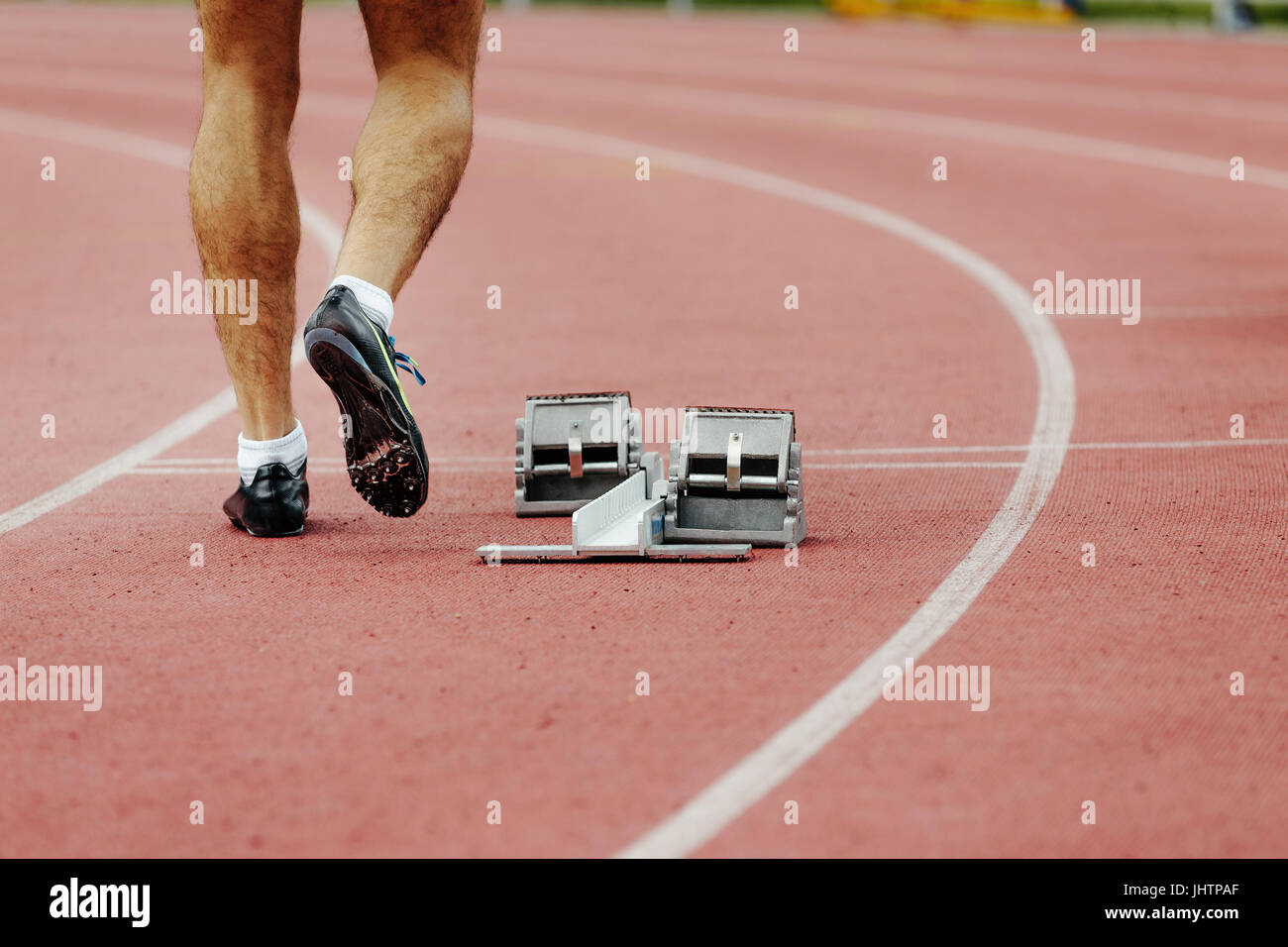 feet men runner sprinter track and starting blocks Stock Photo Alamy