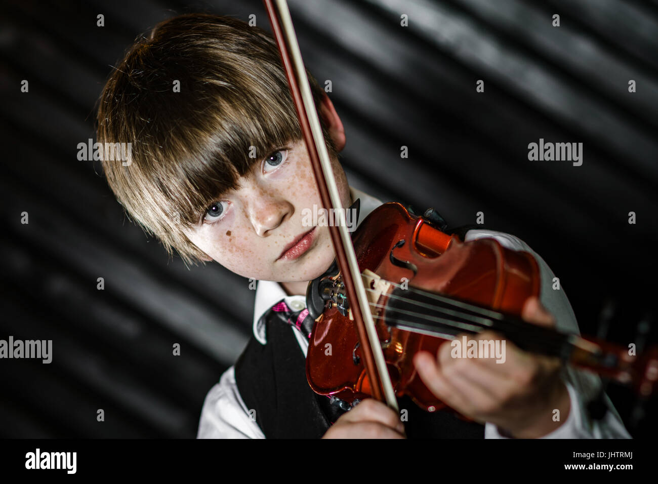 Attractive Boy Playing Violin Studio Shooting Music Concept Stock   Attractive Boy Playing Violin Studio Shooting Music Concept JHTRMJ 