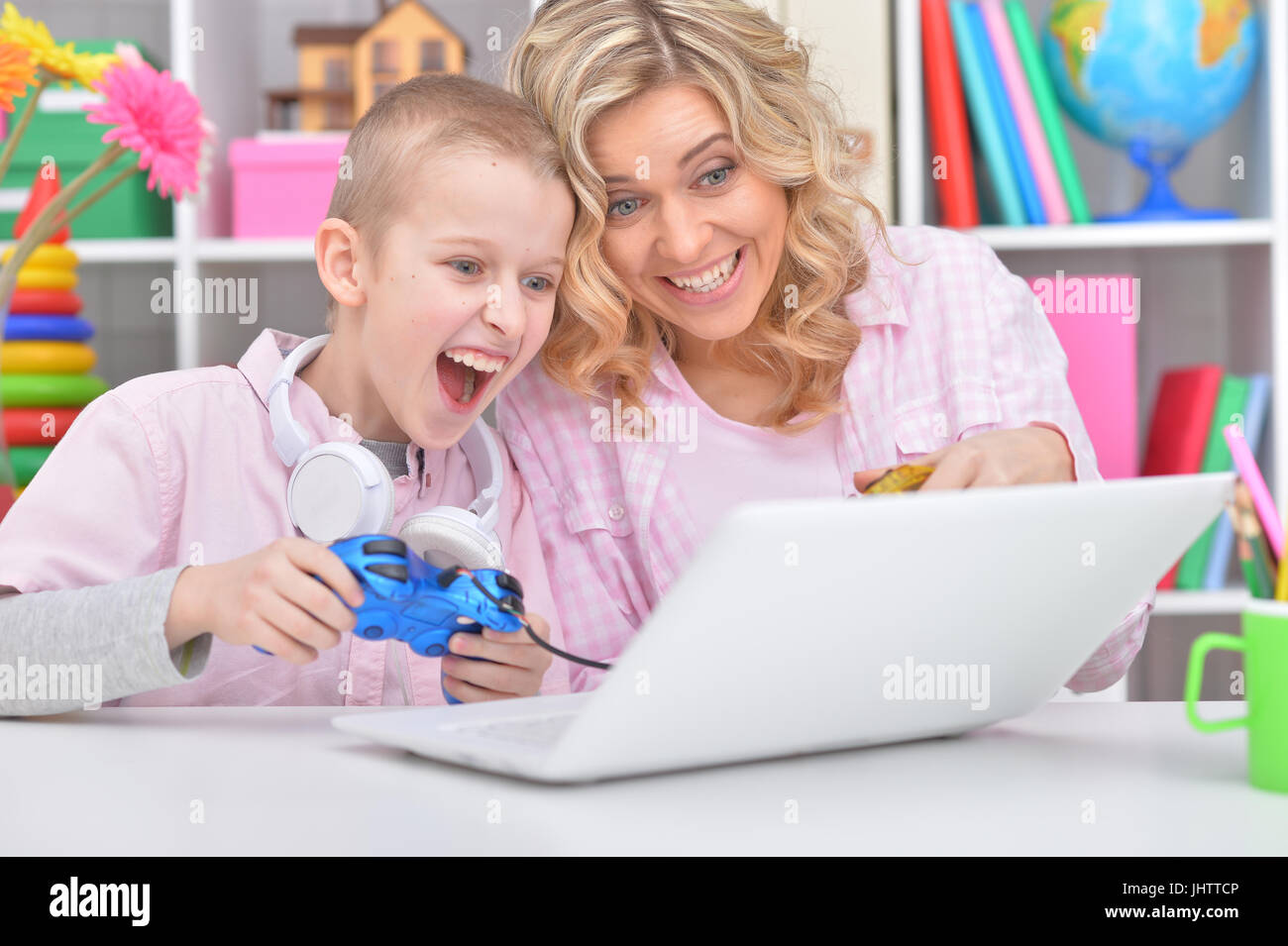 Mother and son playing game Stock Photo