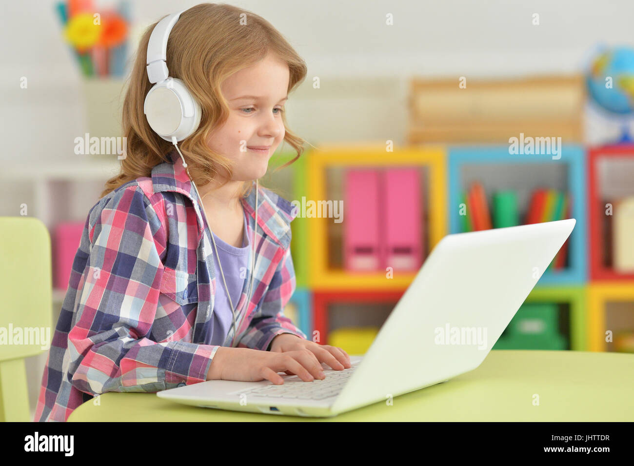 little girl using modern laptop Stock Photo - Alamy