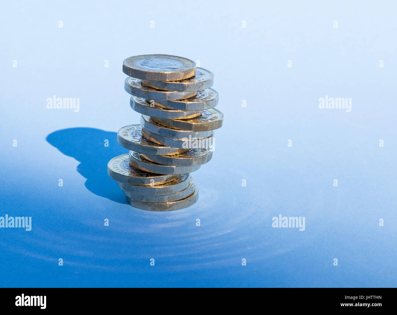 Pile of new one pound coins Stock Photo