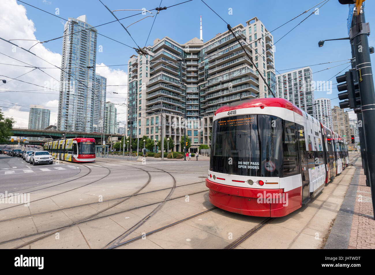 Toronto, CA - 26 June 2017: Toronto Flexity Outlook Streetcar running along the tram lines on Queens Quay W. Stock Photo