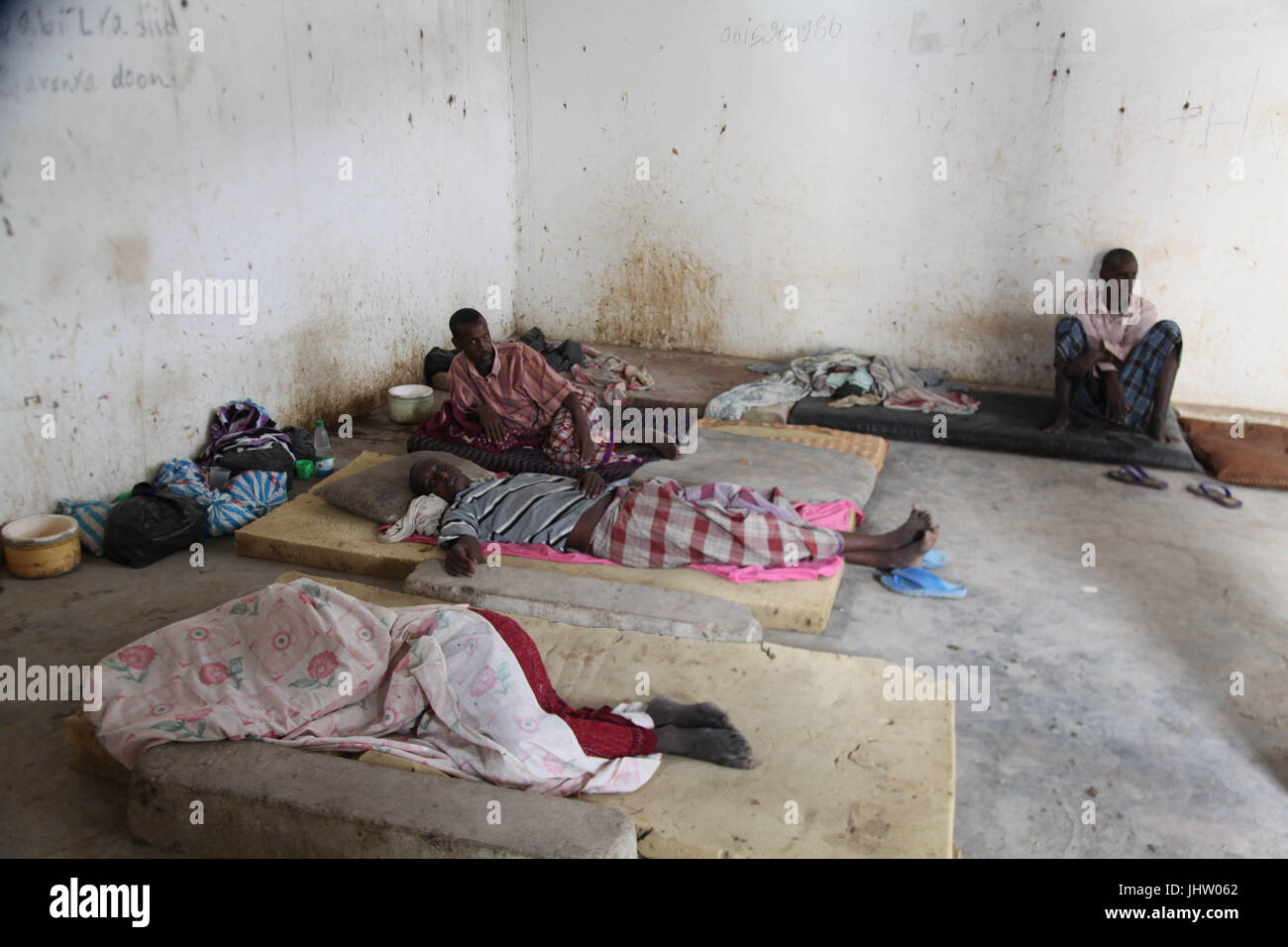 Mentally disabled patients rest on their beds at the Habeeb Mental Hospital December 24, 2013 in Mogadishu, Somalia.    (photo by Ilyas A. Abukar  via Planetpix) Stock Photo