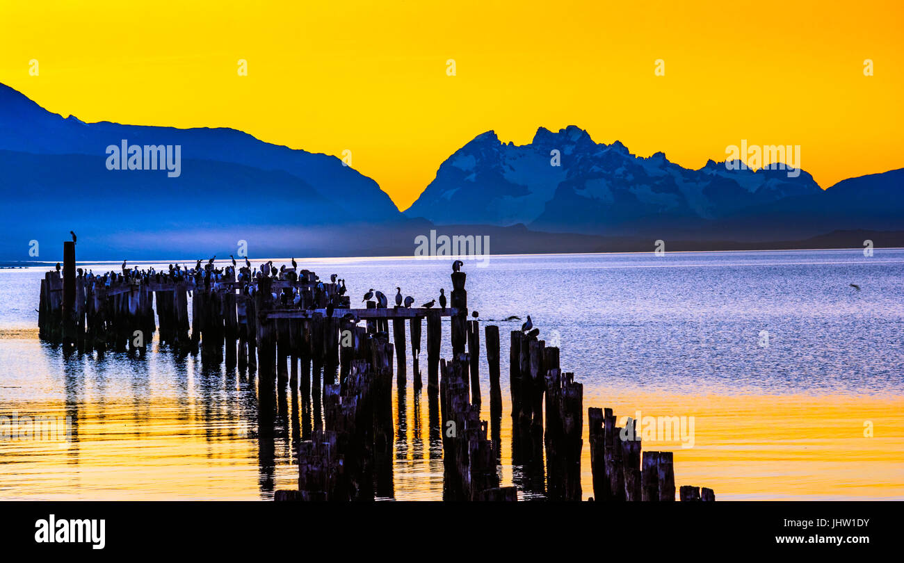 Gulf Almirante Montt,Puerto Natales, Chile - Pacific Ocean waters in Chile, Patagonia, Magallanes Region at sunset Stock Photo