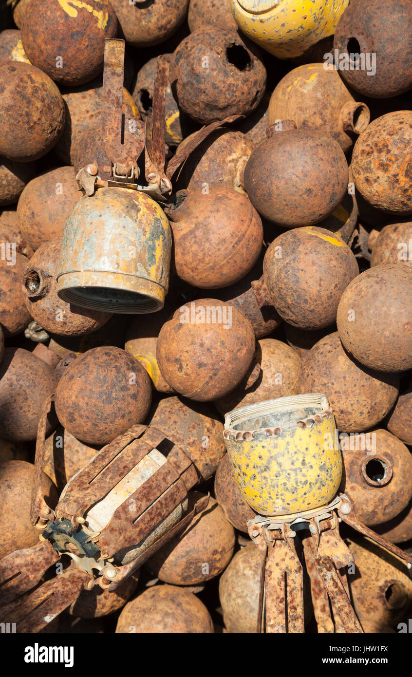 Deadly harvest left over from the Vietnam War. Defused by explosive ordnance engineers, US BLU24 and BLU3 cluster bombs Xiangkhouang, Province, Laos. Stock Photo