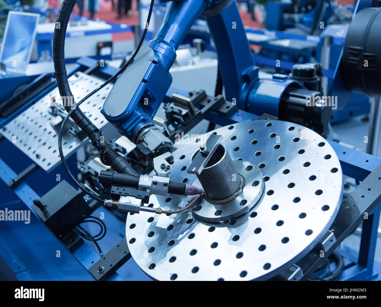Industrial robotic arm for welding. Stock Photo