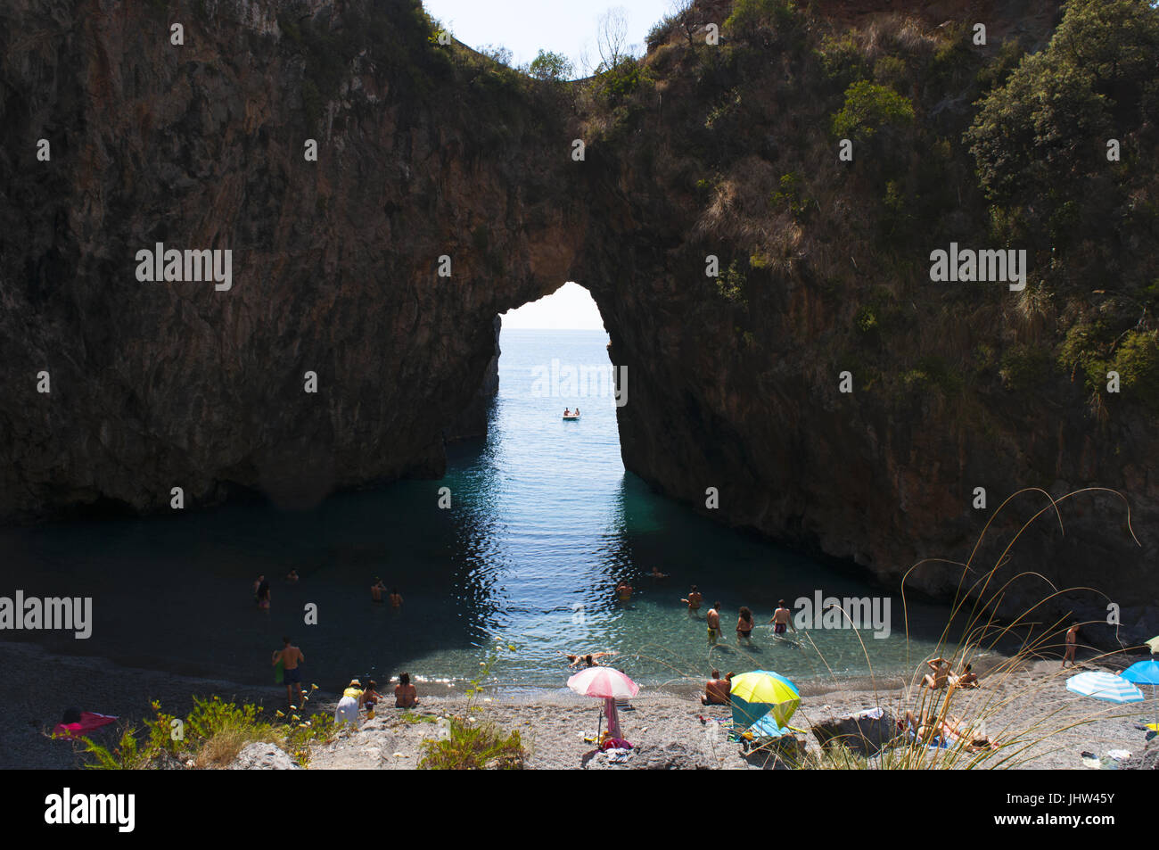 Calabria, Italy: the Arco Magno beach, the Great Arch beach, a hidden little bay with a natural arch done by the waves during the centuries Stock Photo