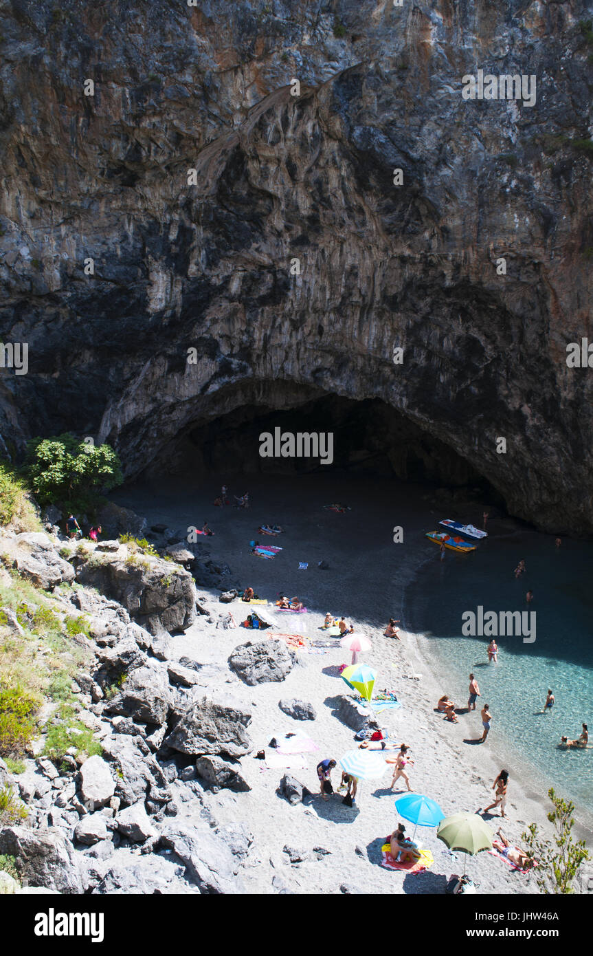 Calabria, Italy: the Arco Magno beach, the Great Arch beach, a hidden little bay with a natural arch done by the waves during the centuries Stock Photo