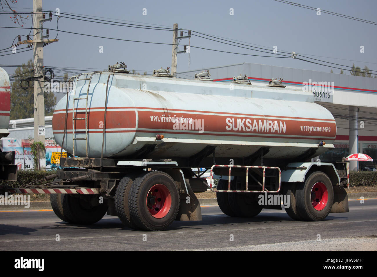 CHIANG MAI, THAILAND -FEBRUARY 20 2017: Isuzu FYH360 Trailer Truck and Palm Oil Tank Truck of Suksamran Transport. Photo at road no 121 about 8 km fro Stock Photo