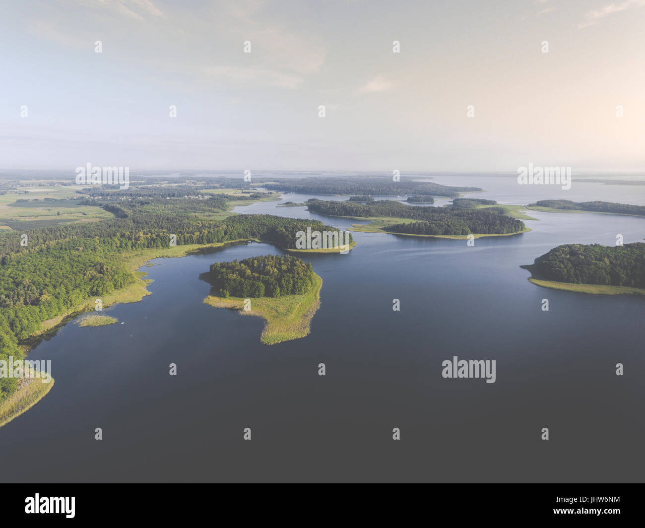 aerial-view-of-green-islands-and-clouds-at-summer-sunny-morning