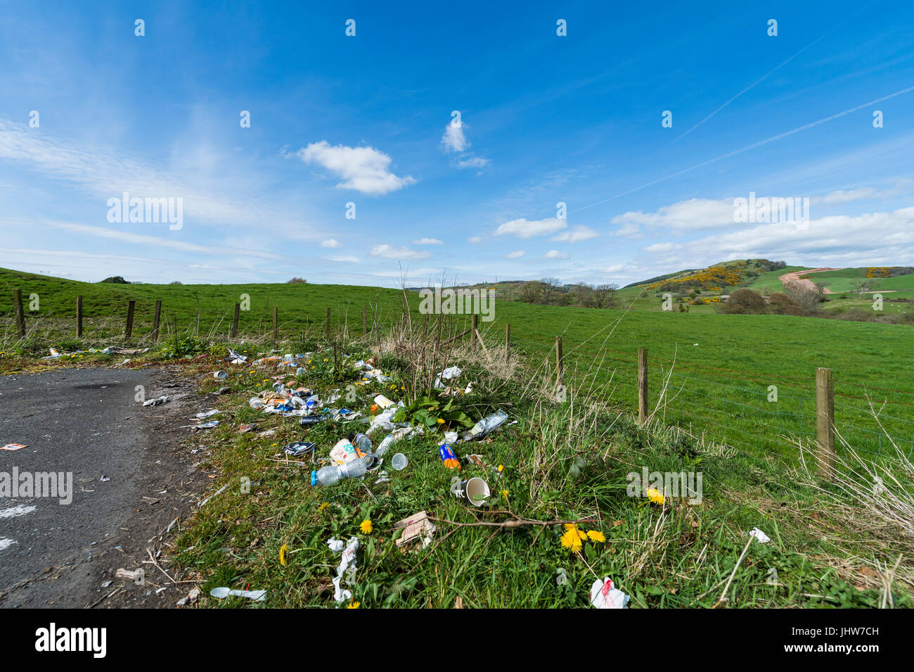 Dumfries, Scotland, UK - April 23, 2017: Discarded litter at the side of a rural road near Dumfries in Dumfries and Galloway, south west Scotland. Stock Photo