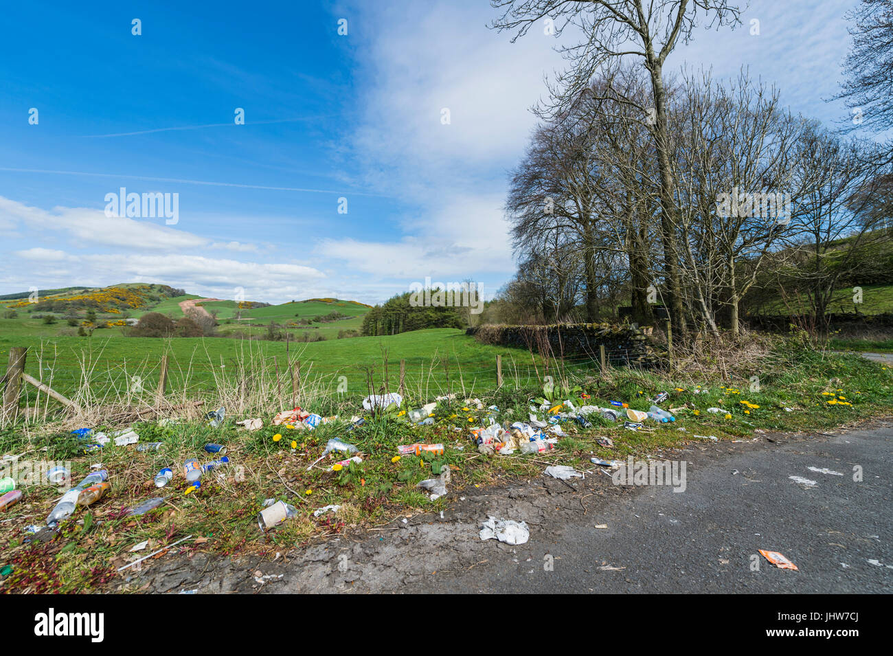 Dumfries, Scotland, UK - April 23, 2017: Discarded litter at the side of a rural road near Dumfries in Dumfries and Galloway, south west Scotland. Stock Photo