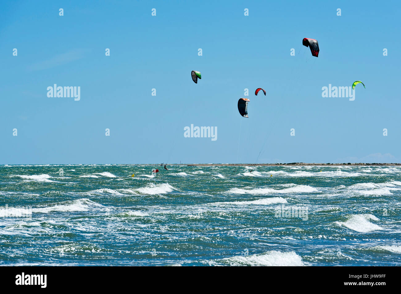 Kite surfing and windsurfing off riumar beach parc natural del hires