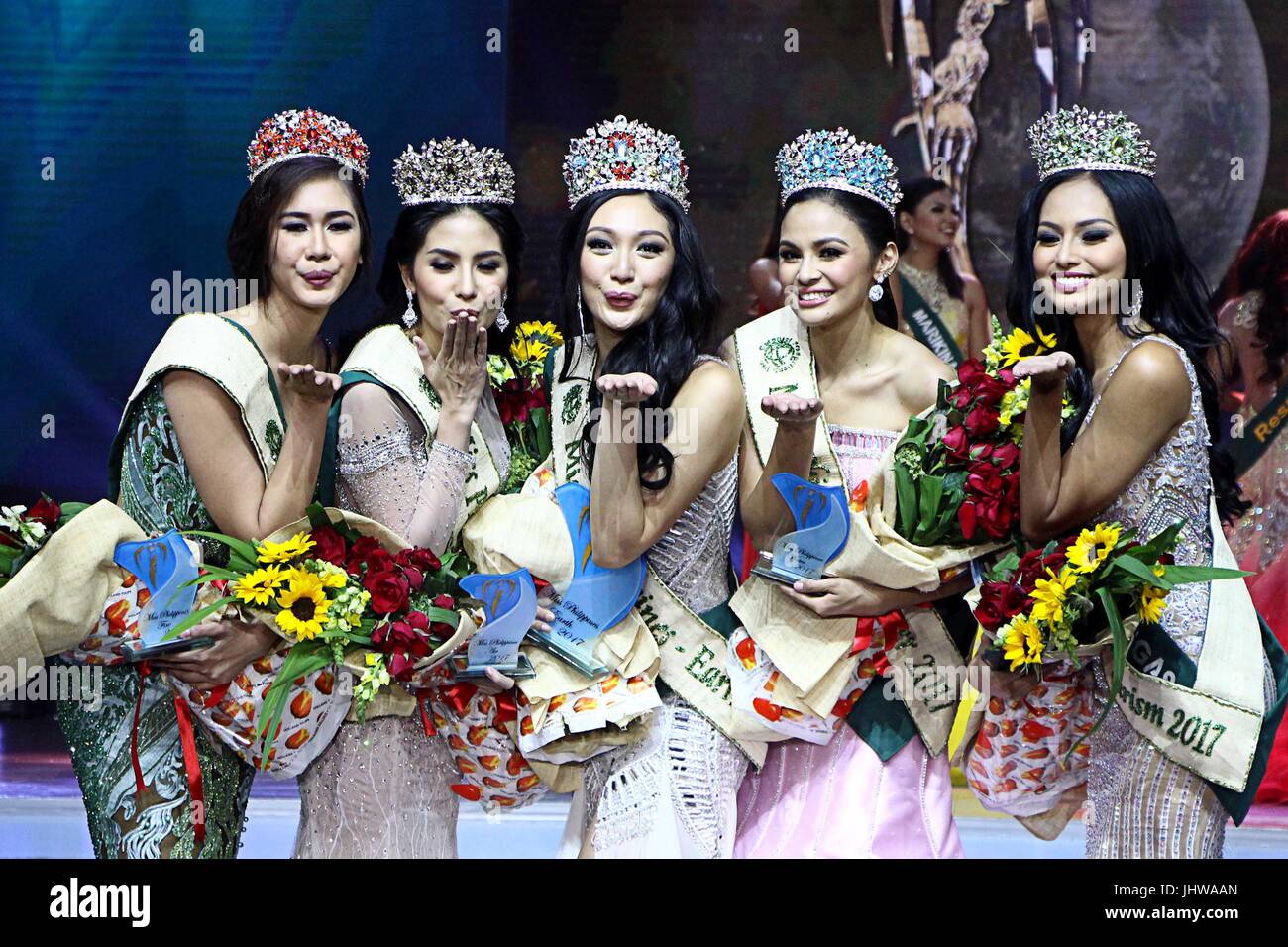 From left to tight: Ms. Philippines Fire 2017 Neliza Bautista (Villanueva, Misamis Oriental), Ms. Philippines Air 2017 Kim De Guzman (Olongapo City), Ms. Philippines Earth 2017 Karen Ibasco (Manila City), Ms. Philippines Water 2017 Jessica Marasigan (Caloocan City), and Ms. Philippines Eco-tourism 2017 Vanessa Mae Castillo (Lobo, Batangas) took a striking pose during the Miss Earth Philippines coronation night at Mall Of Asia (MOA) Arena in Pasay City on July 15, 2017. It's a total of 40 candidates participated in The Miss Earth Philippines 2017. (Photo by Gregorio B. Dantes Jr./Pacific Press) Stock Photo