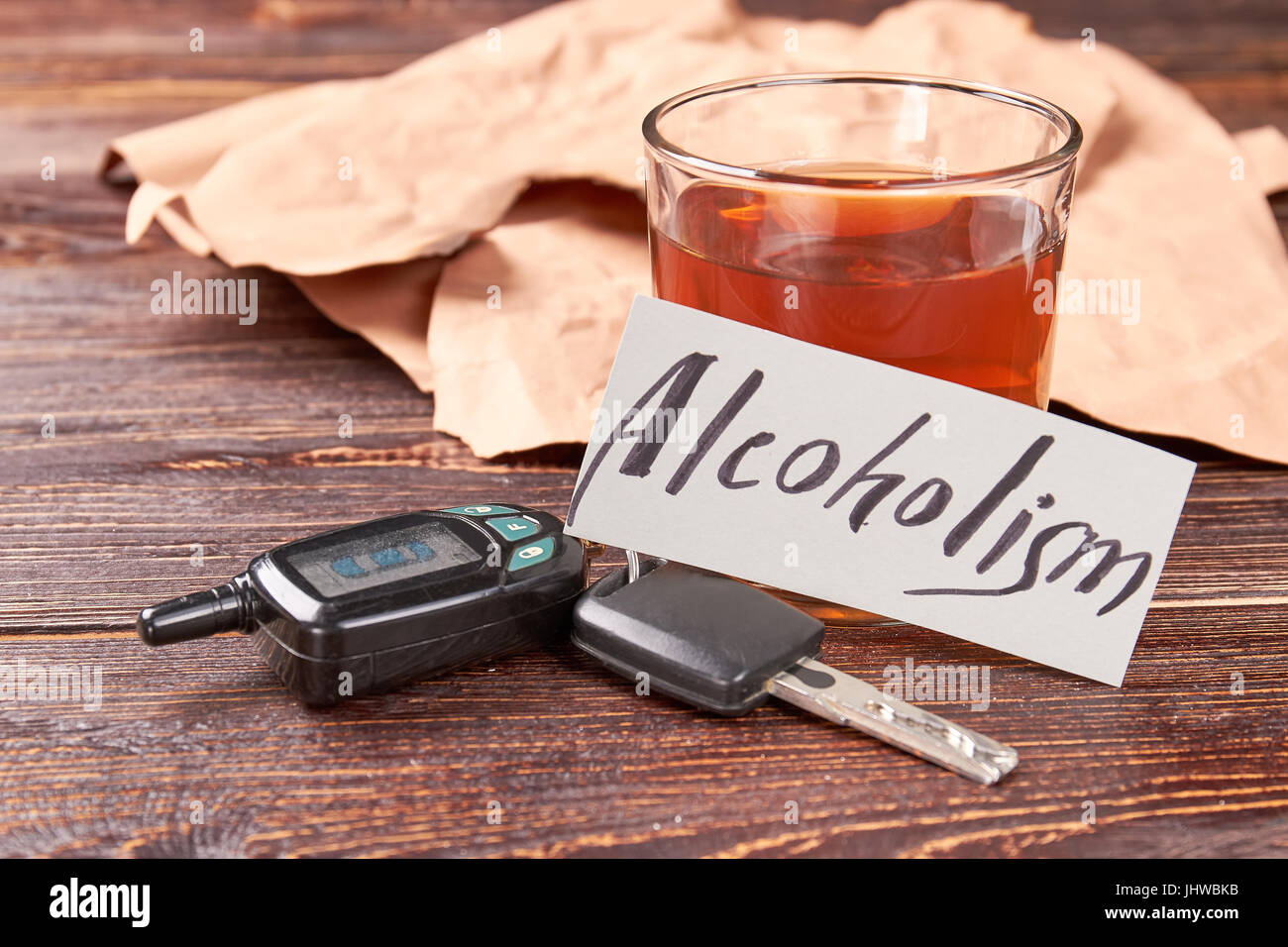 Whiskey glass with car keys Stock Photo Alamy