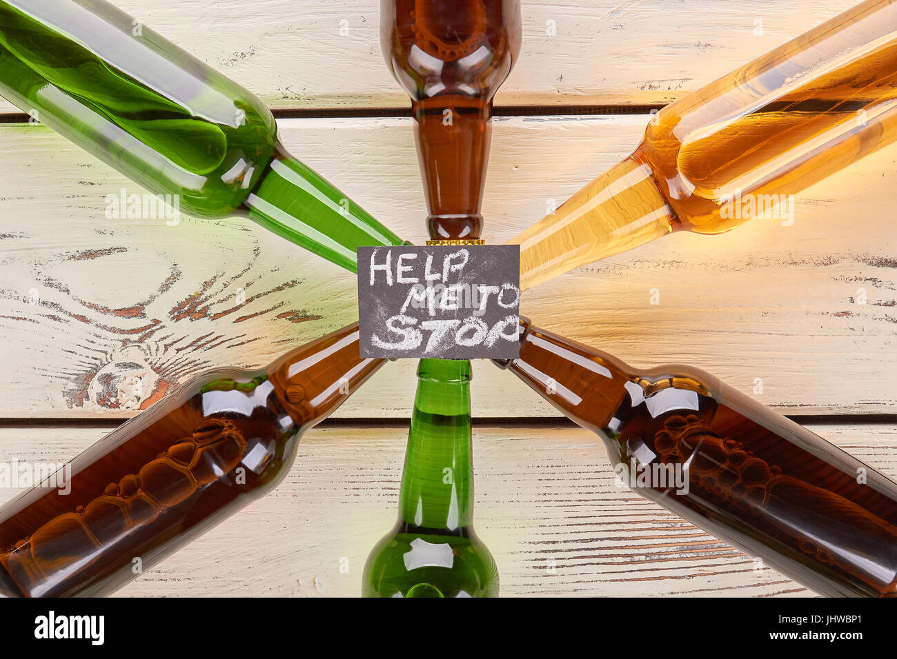 Alcohol dependence concept, wooden table Stock Photo Alamy
