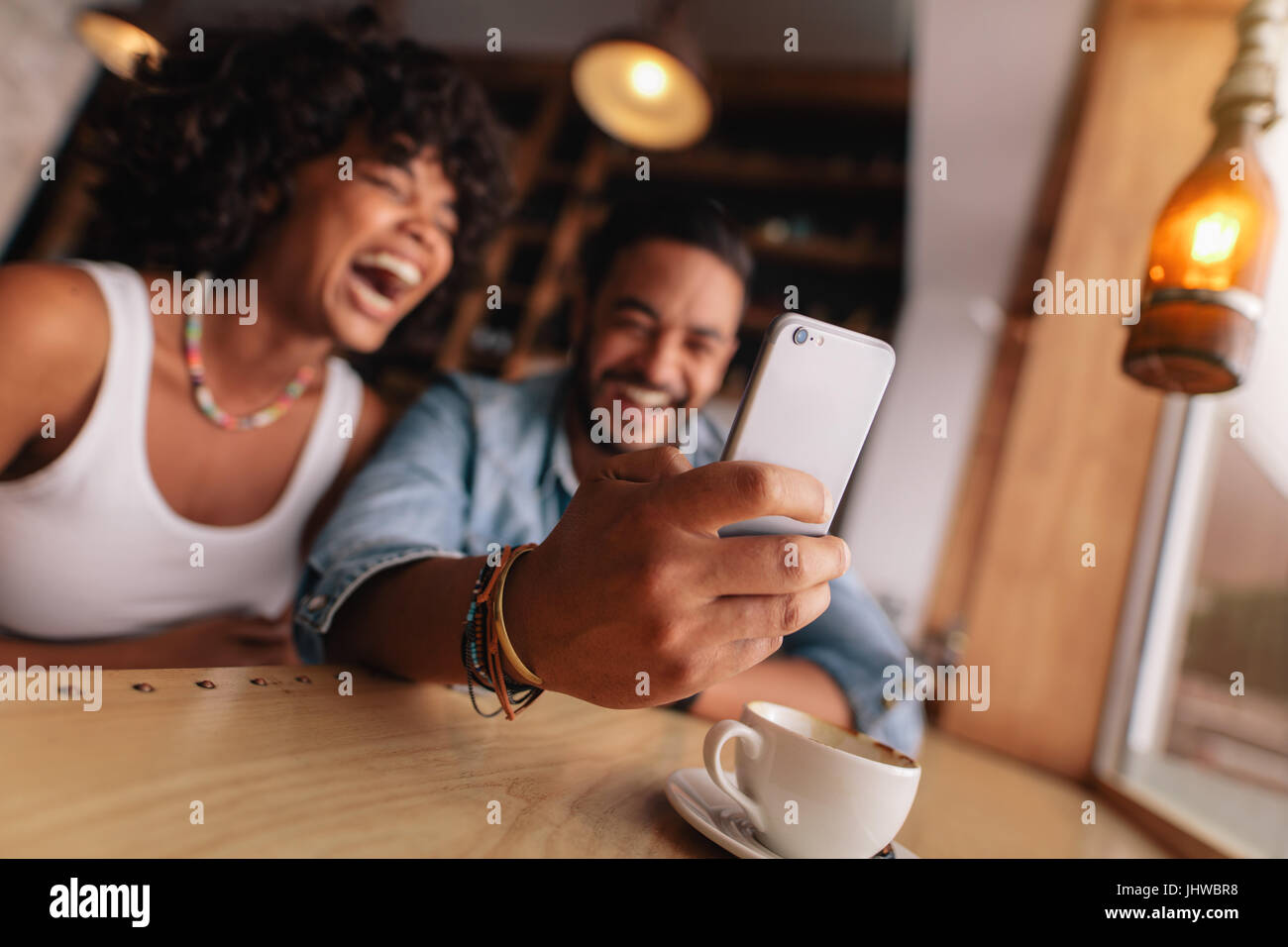 Smart couple holding hands hi-res stock photography and images - Alamy
