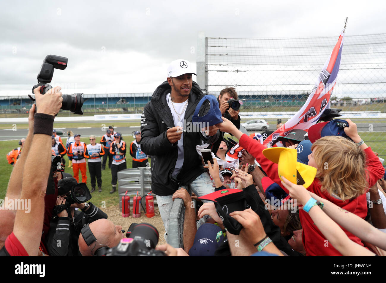 Mercedes' Lewis Hamilton signs autographs for fans during the 2017 ...