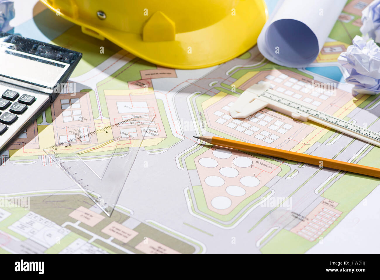 Architects workplace - architectural project with blueprints. Stock Photo