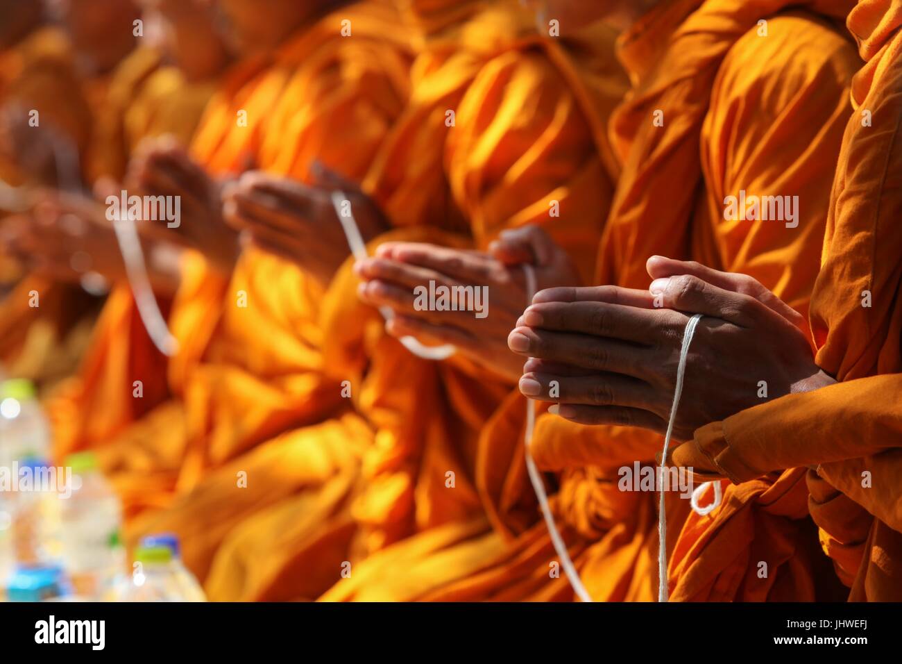 Thai Buddhist Monks pray during an assembly for exercise Cobra Gold February 17, 2017 in Ban Non Lueam, Korat Province, Thailand.    (photo by Maximiliano Rosas  via Planetpix) Stock Photo