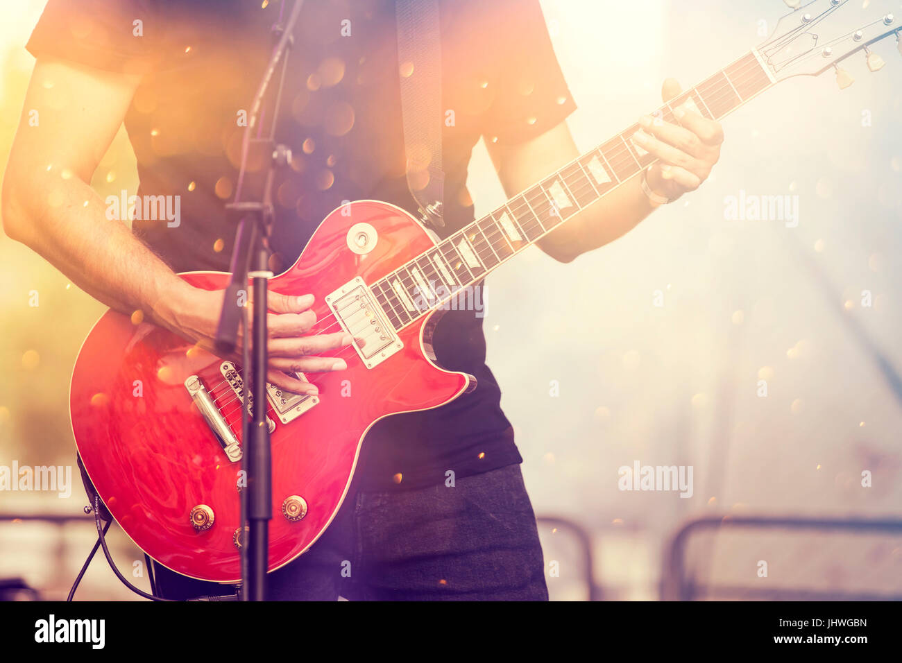 Guitarist in stage lights Stock Photo Alamy