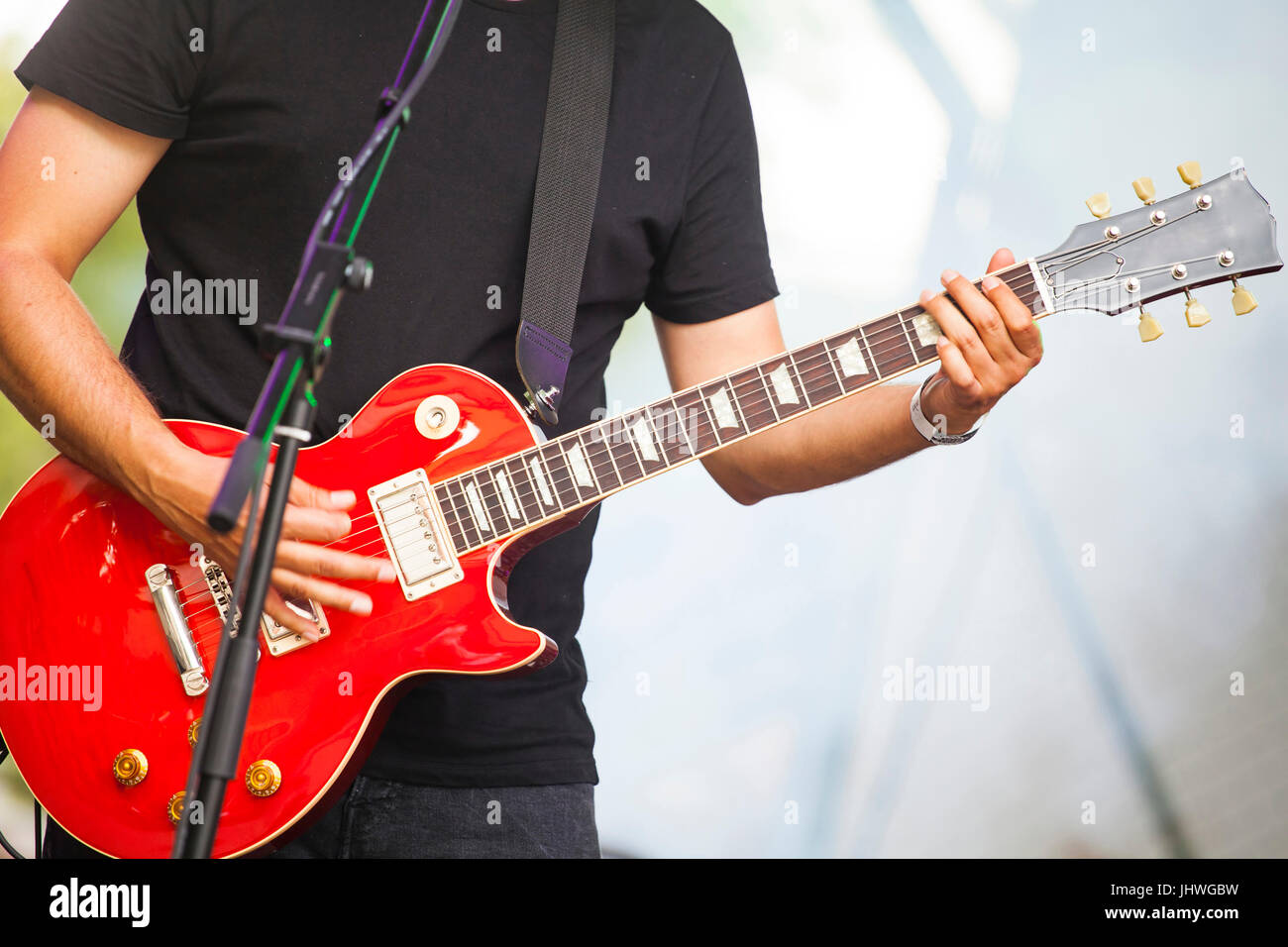Guitarist in stage lights Stock Photo Alamy