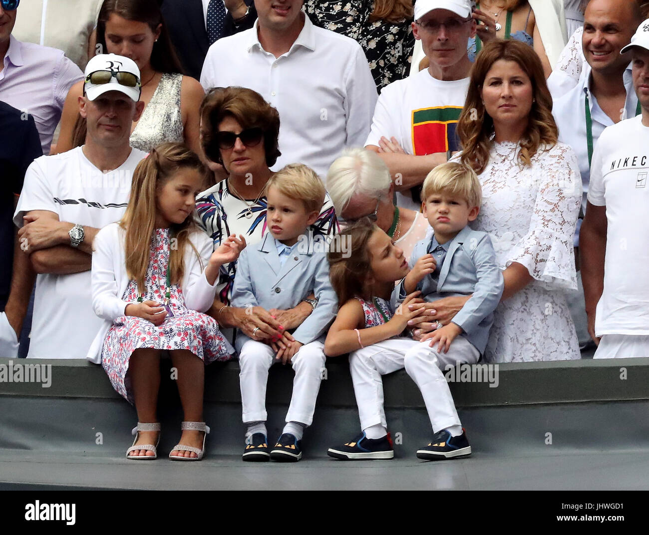 Charlene Riva Federer, Myla Rose Federer, Lenny Federer, Leo Federer, with their mother Mirka Federer and grandmother, Lynette Federer after Roger Federer wins the the Gentlemen's Singles Final on day thirteen of the Wimbledon Championships at The All England Lawn Tennis and Croquet Club, Wimbledon. Stock Photo