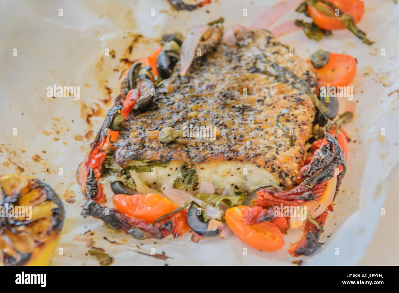 Sea bass Al Cartoccio fresh sea bass fillet cooked in parchment paper