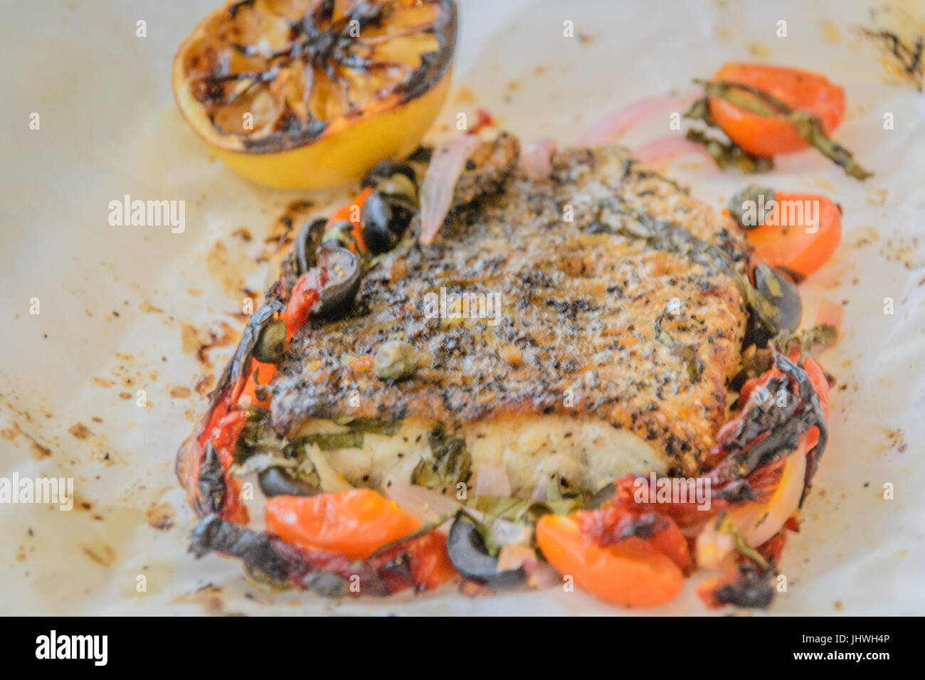 Sea bass Al Cartoccio fresh sea bass fillet cooked in parchment paper