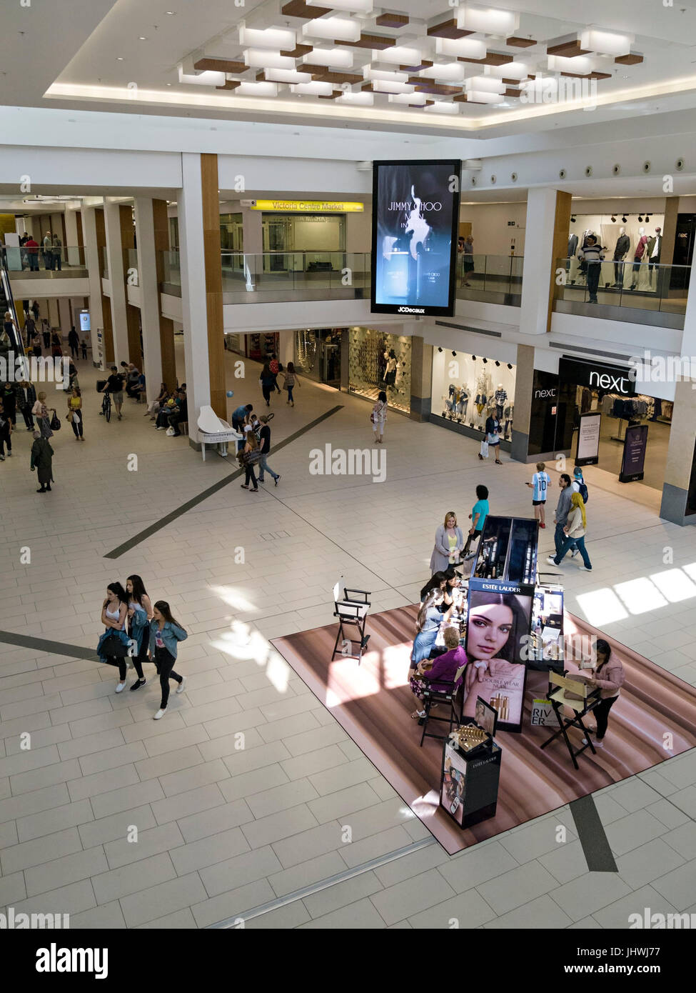 Shops, shoppers and Plaza inside Victoria Centre shopping mall