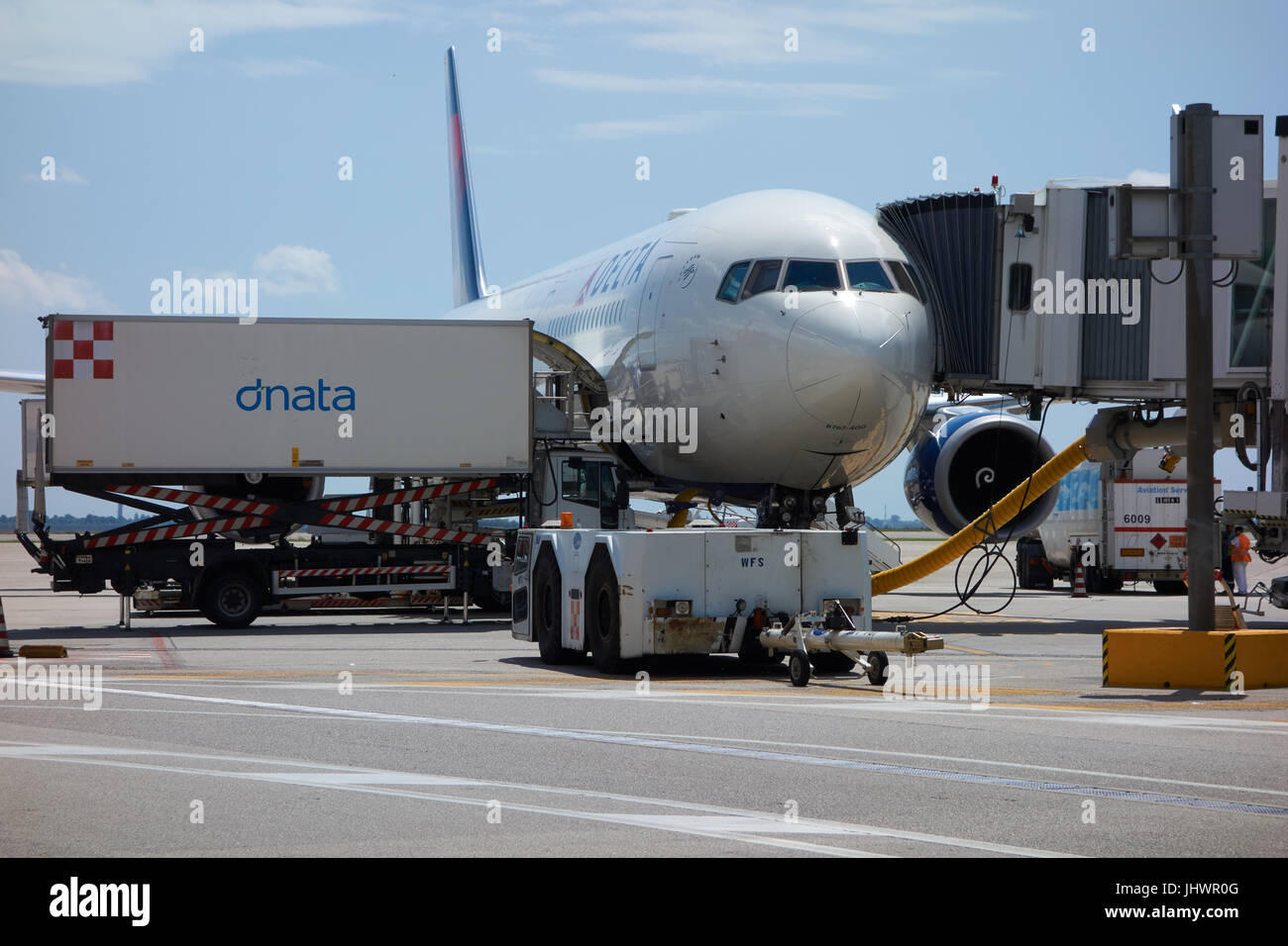 Jet Airliner at gate being prepared for flight. Venice airport. Italy Stock Photo