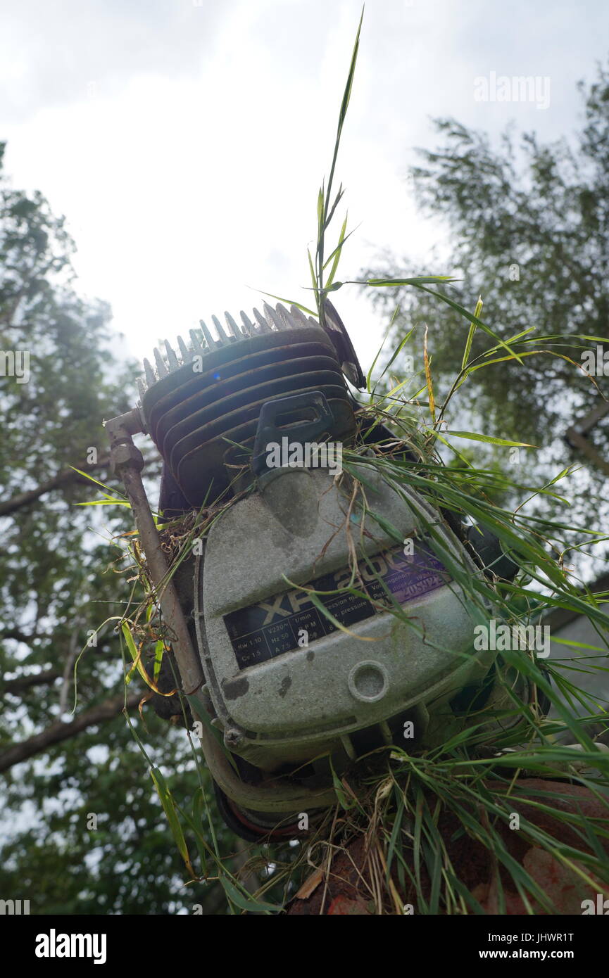 Old rustic rosty compressor outdoor Stock Photo