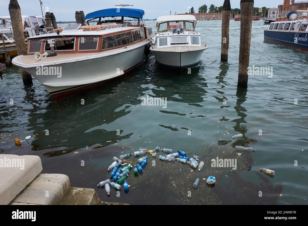 Plastic bottles floating in water. Venic. Italy Stock Photo Alamy