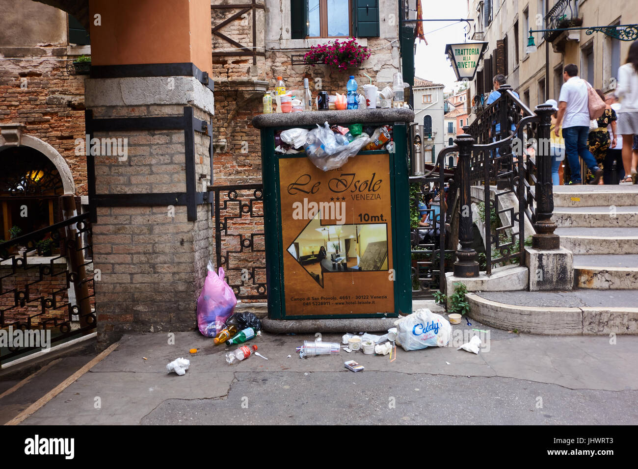 Overflowing waste bin. Venice. Venic. Italy Stock Photo