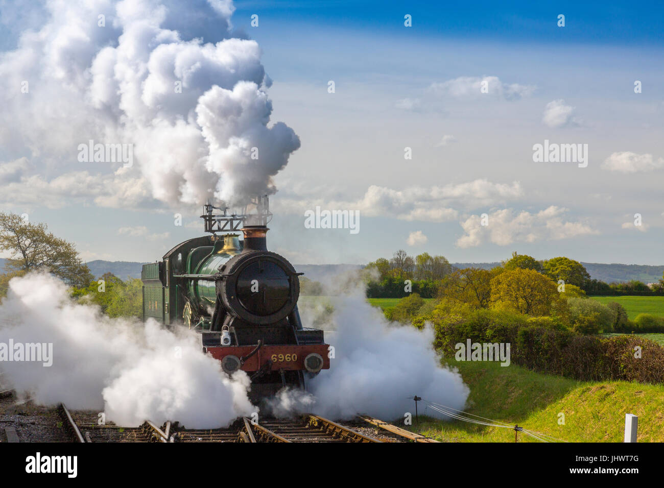 ExGWR loco 6960 'Raveningham Hall' makes a dramatic arrival in