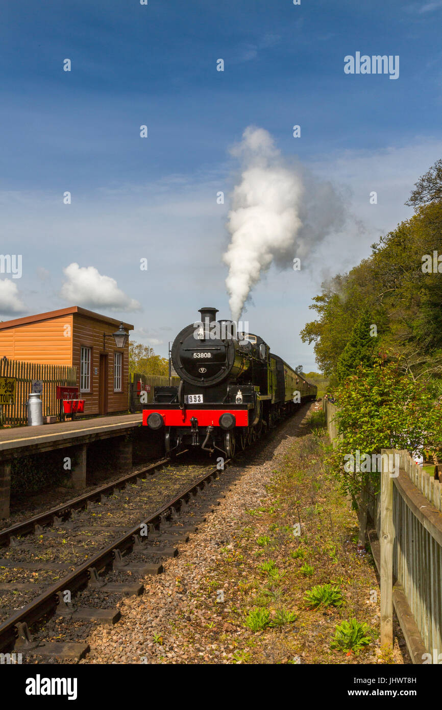 Ex-LMS and S&D loco 53808 arrives at Stogumber station with a train to Bishops Lydeard on the West Somerset Railway, UK Stock Photo
