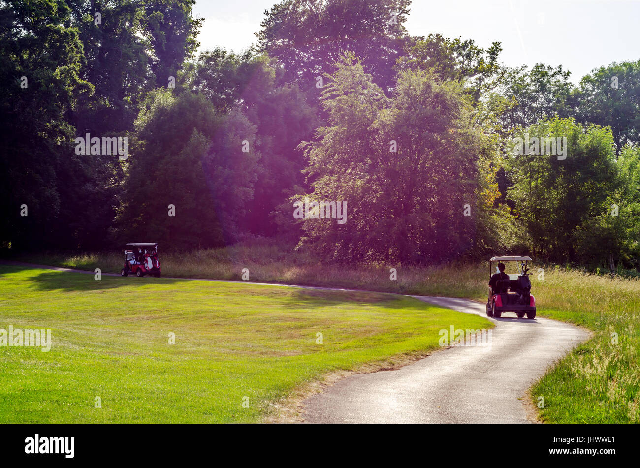 Electric car on the golf course, active leisure, quiet sport