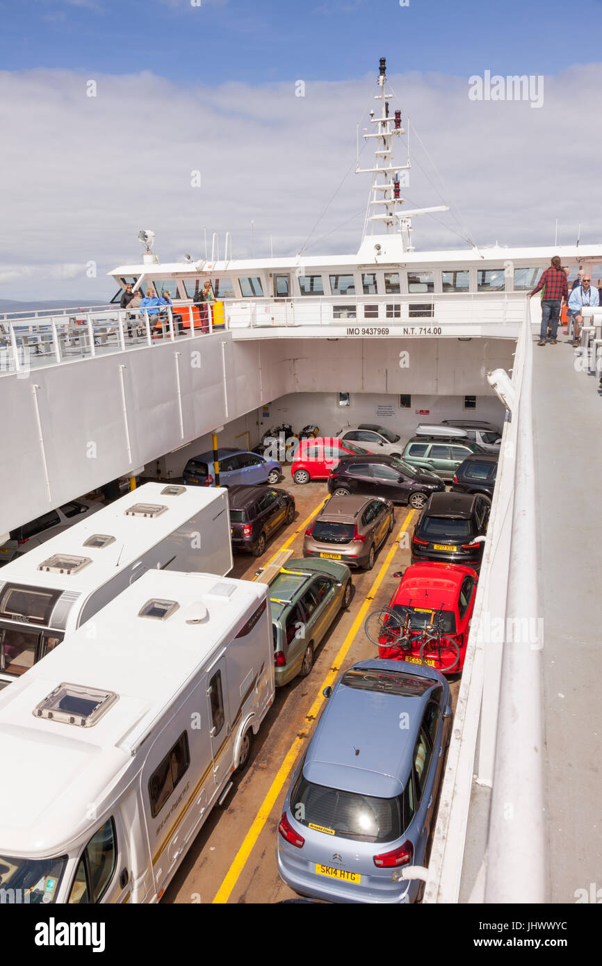 Passengers and vehicles aboard the Pentland ferry from Gills Bay in Caithness to St Margaret's Hope, South Ronaldsay in Orkney UK Stock Photo