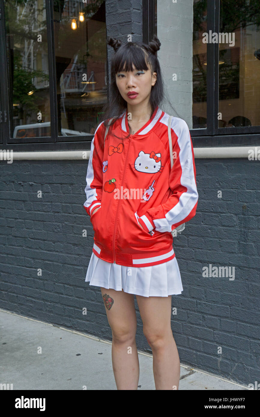Beautiful Taiwanese woman in a Hello Kitty bomber jacket in the East  Village, Manhattan, New York City Stock Photo - Alamy