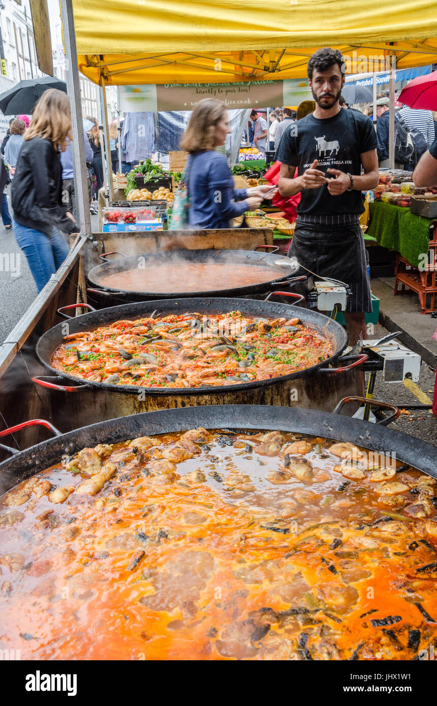 A stall in Portobello Market selling paella Stock Photo Alamy