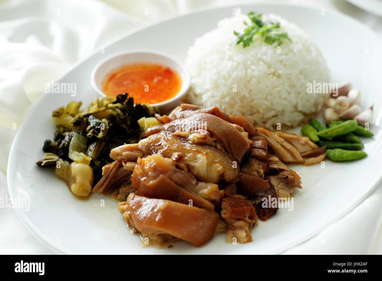 stewed pork leg with rice and vegetable Stock Photo - Alamy