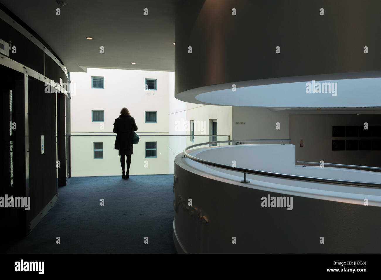 female silhouette, building atrium Stock Photo